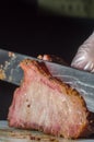 hump steak being sliced Ã¢â¬â¹Ã¢â¬â¹with copy space Royalty Free Stock Photo